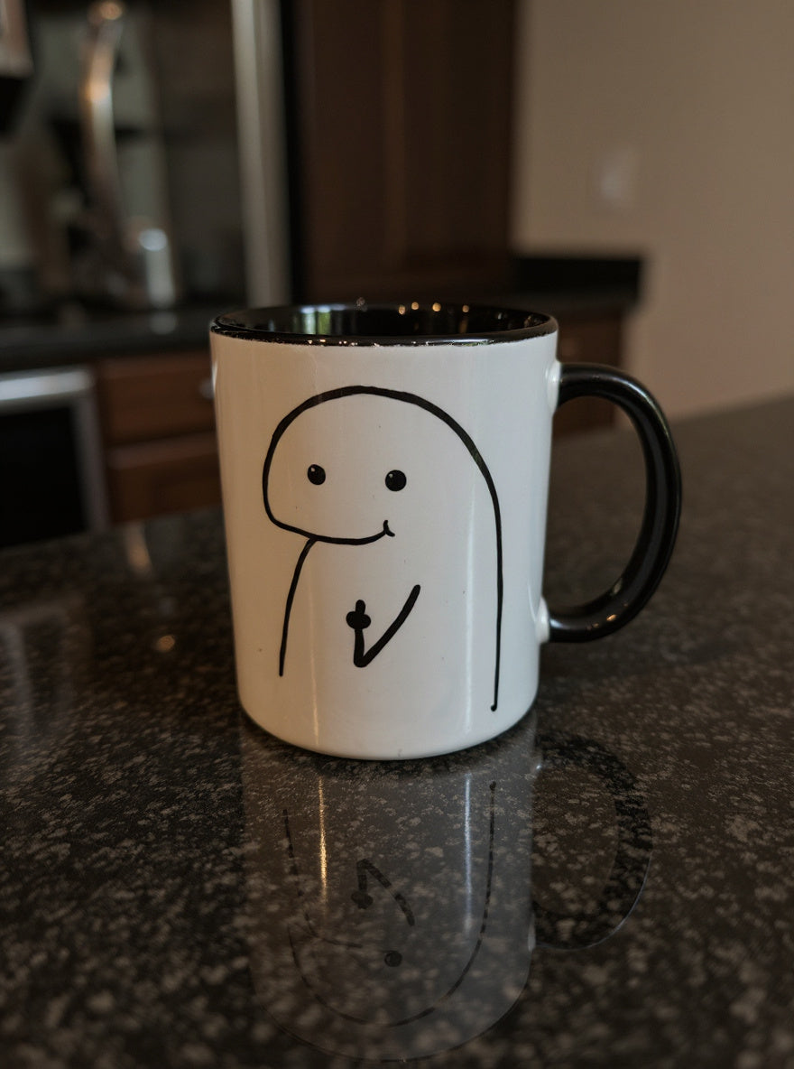 Keramiktasse mit Mittelfinger-Männchen